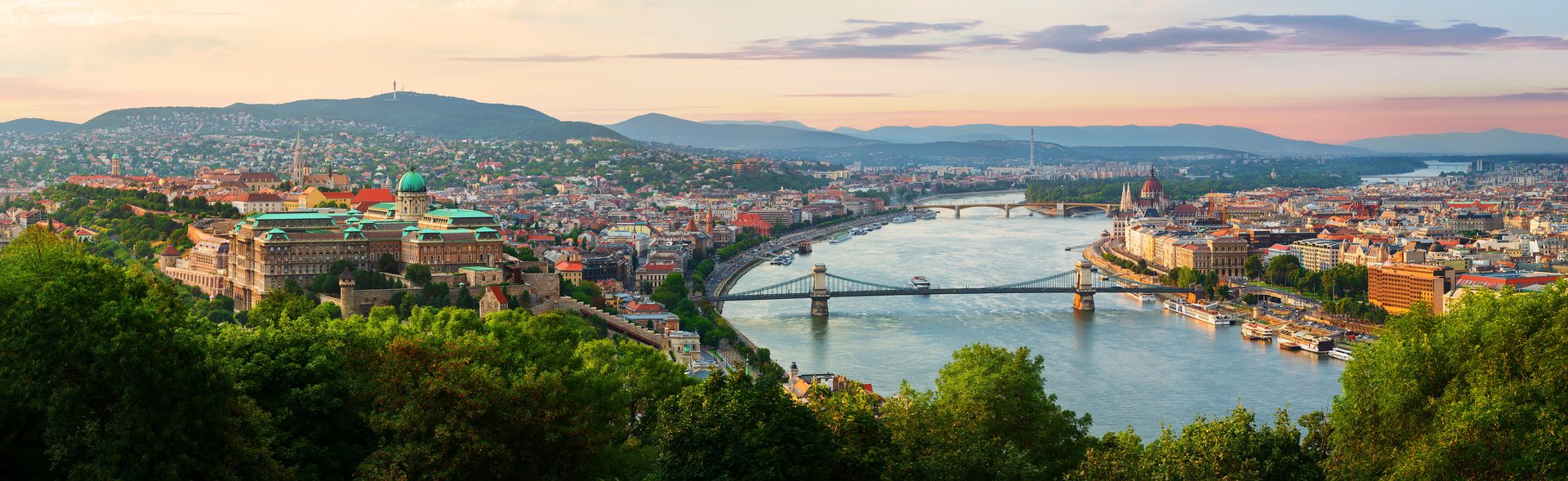 Wide summer sunset panorama across Budapest