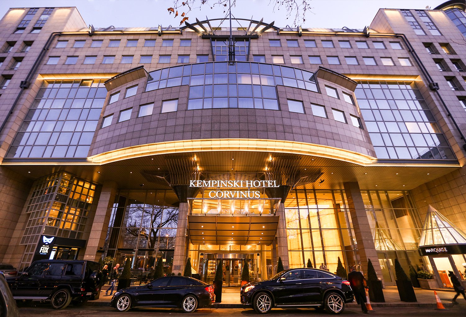 Kempinski Hotel Corvinus exterior at dusk